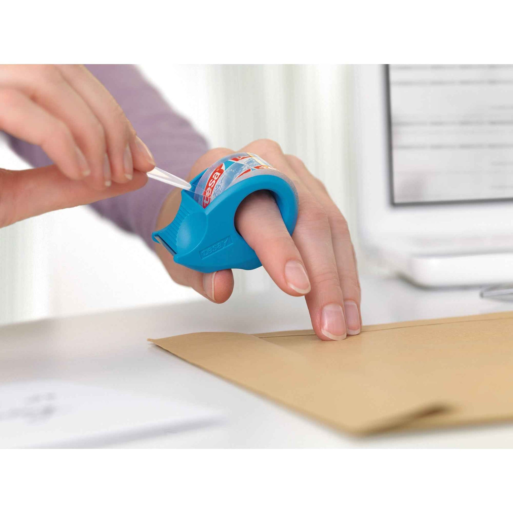 tesa® Handabroller Mini
