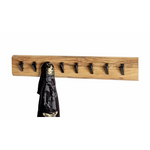 Rustikale Wandgarderobe aus Akazienholz in Schwarz von HAKU, mit Haken für Jacken und Accessoires.